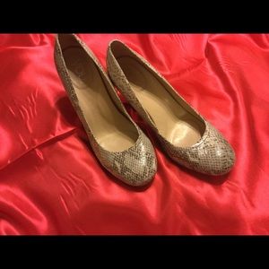 Snakeskin pattern heels. Leather uppers. Size 8.5